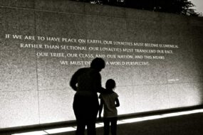 A quote from Martin Luther King, Jr. at the national MLK memorial, reading "If we are to have peace on earth, our loyalties must become ecumenical rather than sectional. Our loyalties must transcend our race, our tribe, our class, and our nation; and this means we must develop a world perspective.
