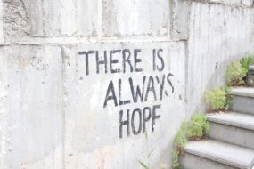 Graffiti reading "THERE IS ALWAYS HOPE"